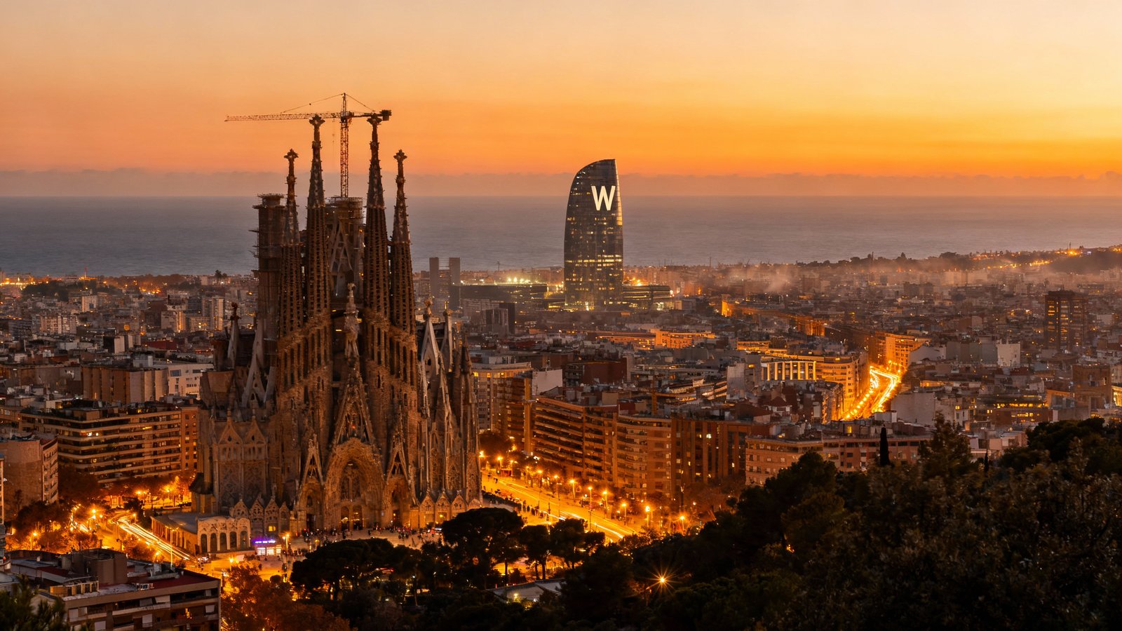 Stunning, ultra-realistic photograph of the Barcelona skyline from Montjuïc Hill at sunset, with warm, vivid colors